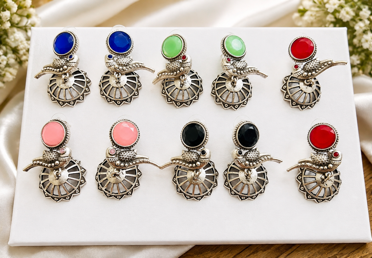 Bird earrings with different stones