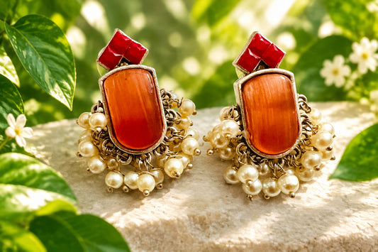 Orange pearl dangling stud earrings
